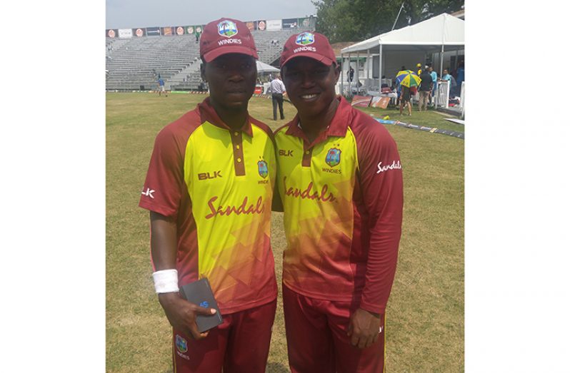 The Guyanese duo of Sherfane Rutherford and skipper Anthony Bramble after yesterday’s game. (Photo by Frederick Halley)