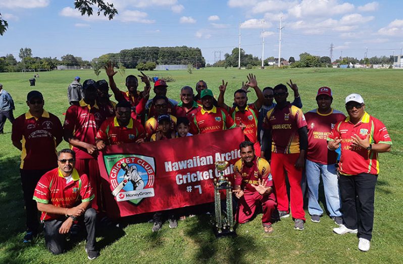 FLASHBACK: The victorious HACC players and supporters following last year’s triumph.
