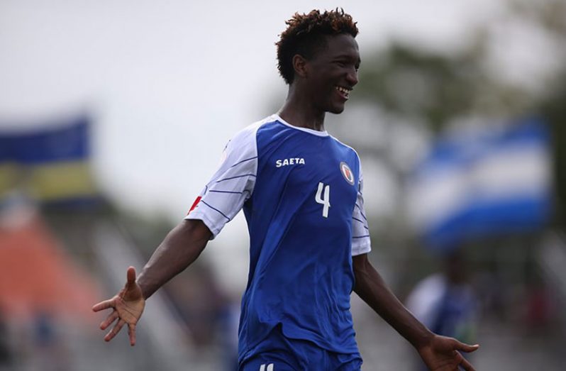 Haiti’s Michel Pierre celebrates after scoring one of his two goals against Guyana during his side’s 6 – 0 win at the CONCACAF U-17 Championship. (Photo compliments: CONCACAF)