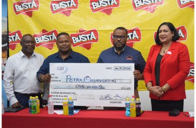 GBI GM Samuel Arjoon handing over the ceremonial cheque to Petra Co-Director Troy Mendonca in presence of Troy Peters and GBI’s Marketing Manager Anita Lall