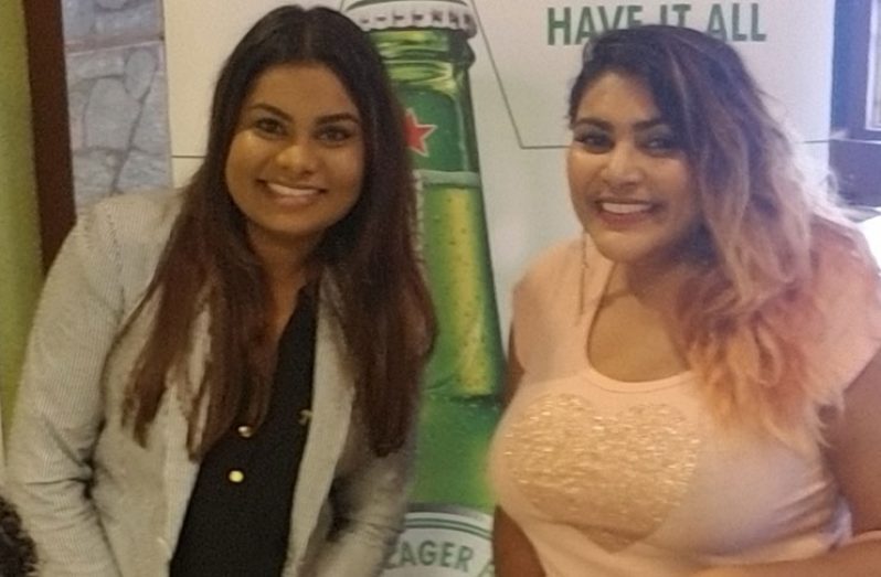 Heineken Portfolio Manager Darshanie Yussuf (left) stands with winner of the Heineken UCL promotion 2018, Nadia Ragnauth.