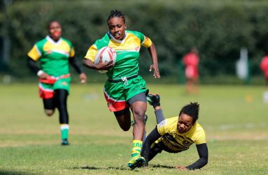 Abioce Heywood powering to score a try against Jamaica in Mexico