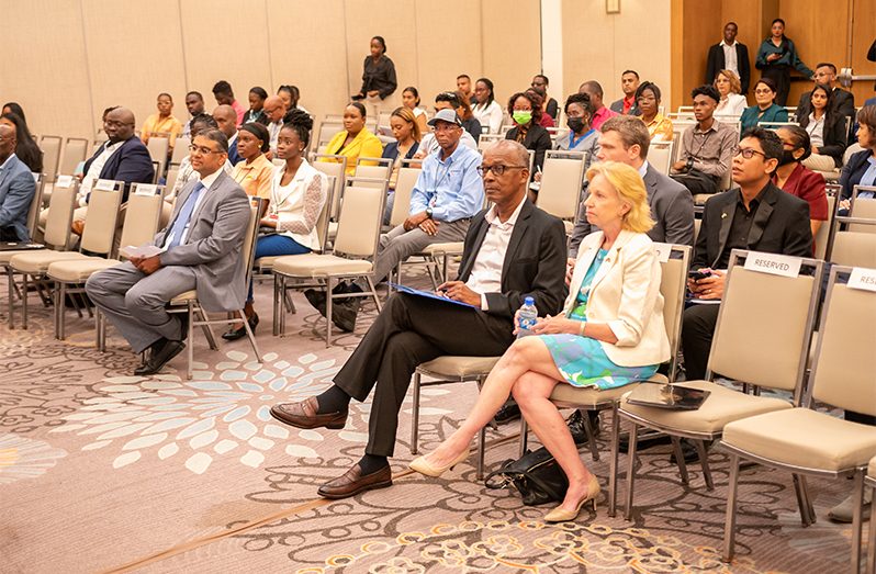 US Ambassador to Guyana Sarah Ann Lynch, and Minister of Labour Joseph Hamilton at the AmCham Guyana Health, Safety, Security, and Environment Conference