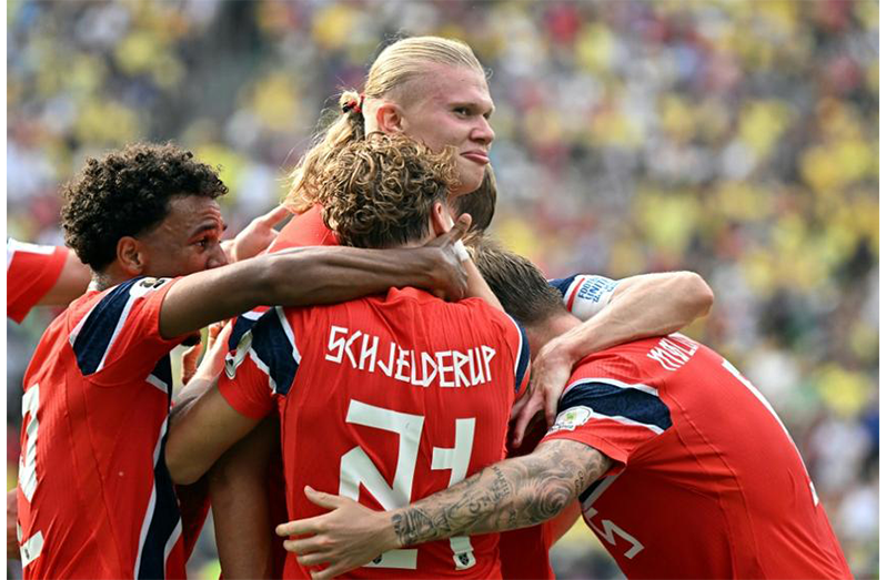 Erling Haaland is mobbed by his teammates after scoring his first goal against Brazil Image: (AFP)