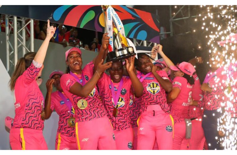 Skipper Hayley Mathews (second left, forefront) and her Royals teammates celebrate with the trophy (Photo: CPLT20)