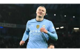 Erling Haaland scores twice to send Man City second