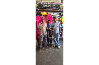 Ramesh Sunich of Trophy Stall, Seeraj Bhimsain of Aash Décor and Frederick Halley pose with one of the trophies that will be up for grabs.