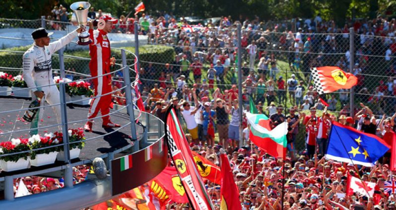 Lewis Hamilton leads the Italian GP from start to finish - but is made to wait for three hours before his win is finally confirmed at Monza yesterday.