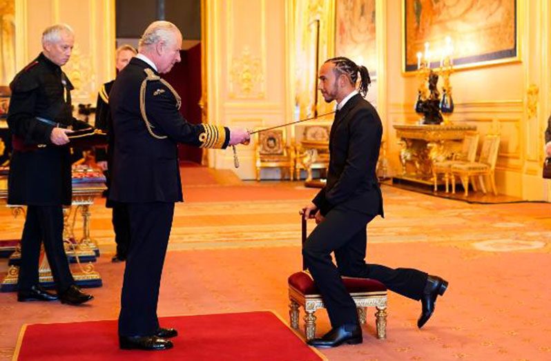 Hamilton is made a Knight Bachelor by Prince Charles