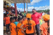 During an engine distribution exercise in Karrau, Region 7, on Saturday, Minister of Natural Resources, Vickram Bharrat, interacted with the children of the community