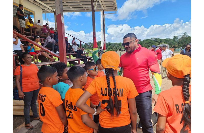 During an engine distribution exercise in Karrau, Region 7, on Saturday, Minister of Natural Resources, Vickram Bharrat, interacted with the children of the community