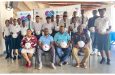 Officials and students at the ball-distribution exercise for the RBL Schools Football League (Japhet Savory photo)