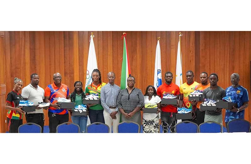 President of the Athletics Association of Guyana Amanda Hermonstine and General Secretary Dr. James Cole with representatives of the clubs (Photo: News Room/Avenash Ramzan)