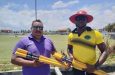 John Ramsingh (left) hands over the stumps to Jermain Maxwell of the Meten-Meer-Zorg Community Centre Cricket Club