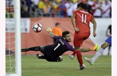 Raul Ruidiaz handles the ball into the back of the net to ensure Peru's progression to the knockout stages and end Brazil's hopes.