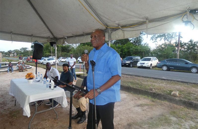 Director-General of the Ministry of the Presidency, Joseph Harmon, addressing Richmond Hill residents on Saturday