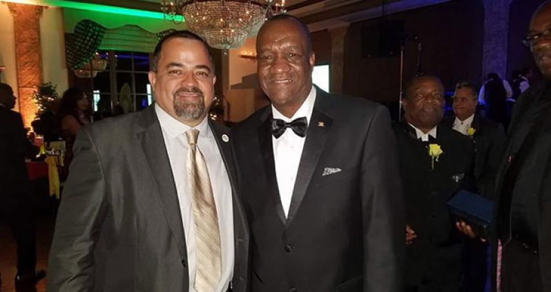Minister of State, Joseph Harmon, with a guest at ‘Signature Grand’, Fort Lauderdale, Florida
