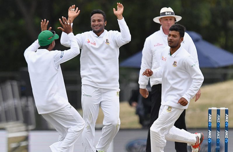 Shakib Al Hasan struck thrice in the final stretch of play on day two in Christchurch.