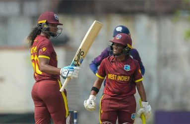 West Indies captain Hayley Matthews raises her bat after getting to her half-century against Scotland in their ICC World Cup Qualifier in Lahore on Wednesday. Looking on is Zaida James (Photo: ICC)