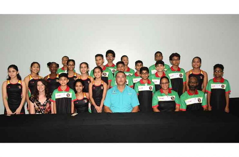 Guyana’s Junior CASA team stands with GSA President David Fernandes (centre) and ExxonMobil Senior Director of Public and Government Affairs Deedra Moe (third from left). (Adrian Narine photo)