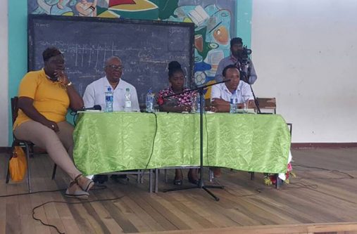 Finance Minister Winston Jordan and Minister of Communities with responsibility 

for Housing,Valarie Patterson, listen attentively to residents during the Linden outreach