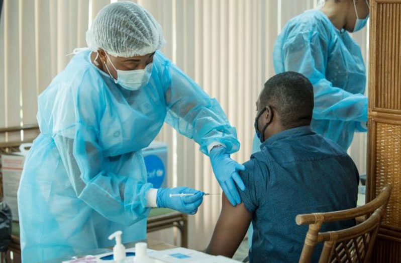 A citizen being vaccinated (DPI photo)