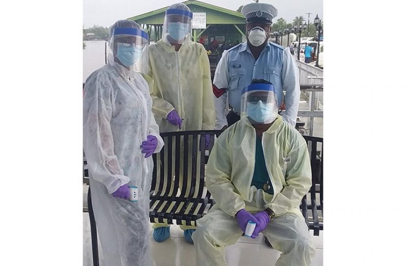 Frontline workers conducting screening at Supenaam