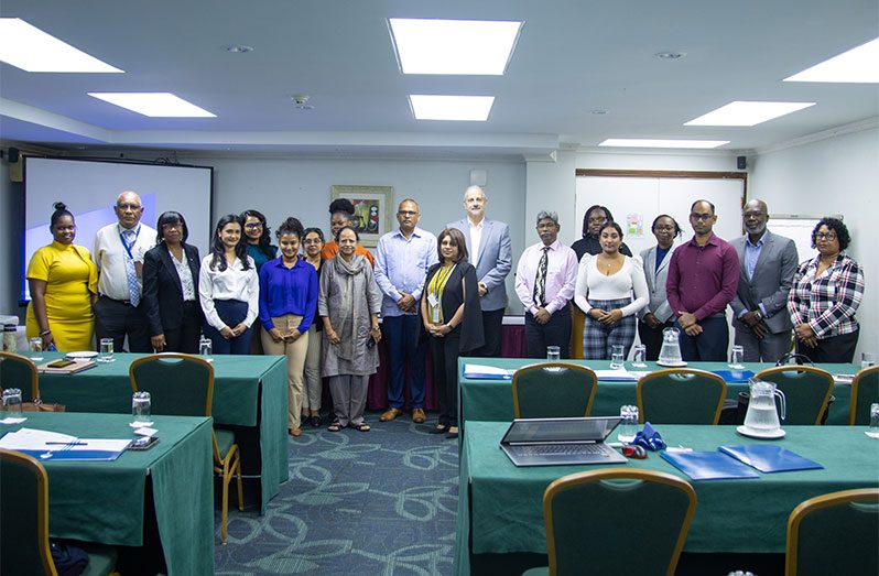 Minister of Health, Dr Frank Anthony; PAHO/WHO Representative to Guyana, Luis Codina; Temporary Adviser at PAHO/WHO and workshop facilitator, Dr Lakshmi Vijayakumar, along with other officials and participants