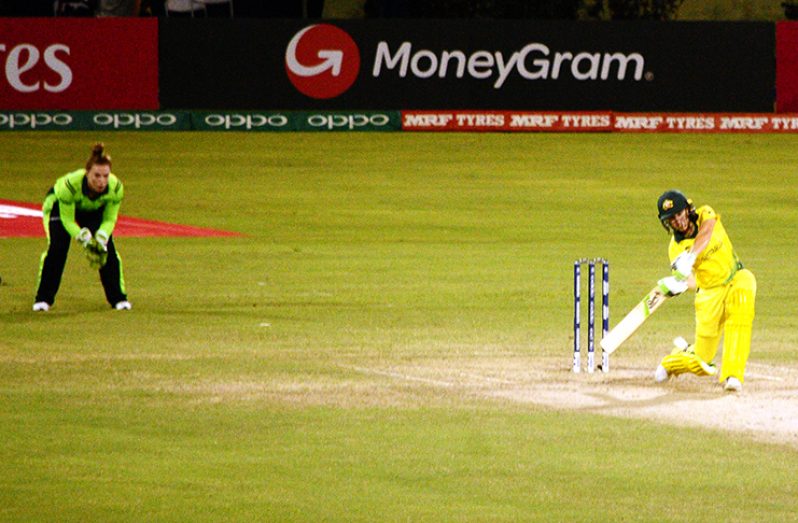Hot Shot: Australia’s shot-maker Alyssa Healy on the go against Ireland in the Women World T20 Group B match at the Guyana National Stadium, Providence (Photo: Adrian Marine)