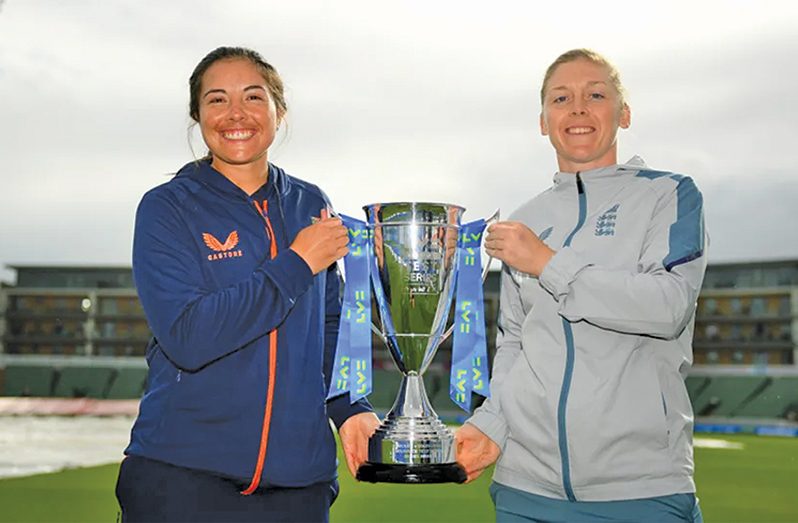 Sune Luus (left) and Heather Knight pose with the trophy after the drawn Test. The two teams collected two points each  (Getty Images)