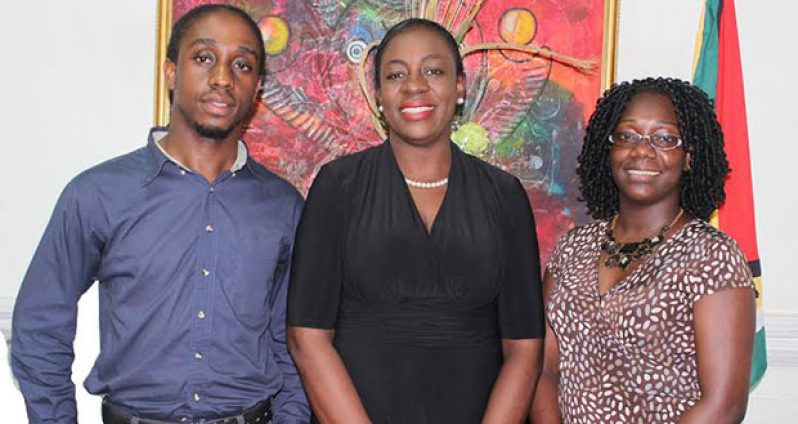 Minister within the Ministry of Education, Nicolette Henry, with Guyana’s Youth Ambassadors Adrian Alfred and Jewel Collier-Swan