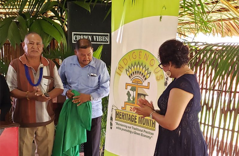 (From Left) Ovid Williams, who submitted the theme that was chosen for Indigenous Heritage Month, with Minister Sydney Allicock and Minister Valerie Garrido-Lowe during the unveiling of the theme.