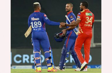 Punjab Kings Chris Jordan congratulates Shikar Dhawan and Shimron Hetmyer after Delhi Capitals comprehensive win.