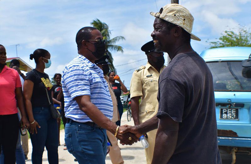 Commissioner of Police (ag) Clifton Hicken meeting with residents of Bare Root, East Coast Demerara on Saturday