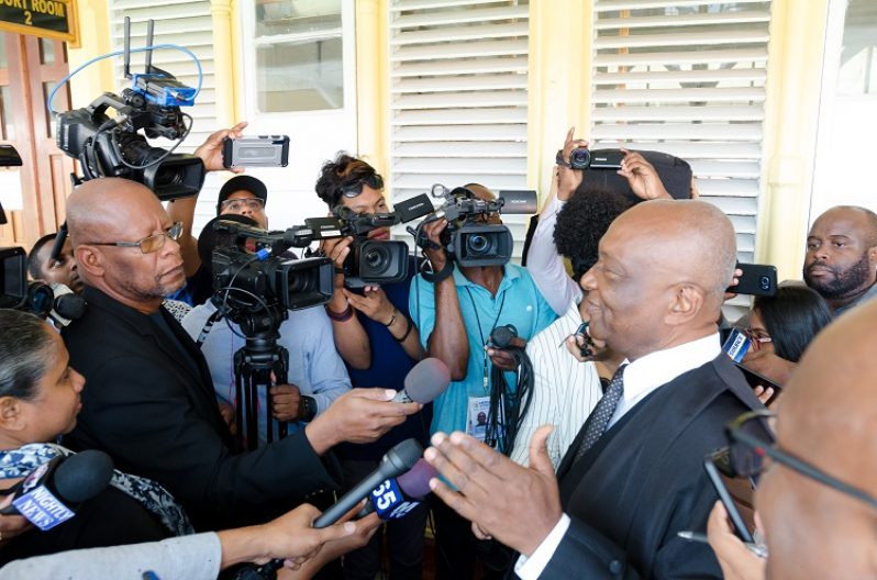 GECOM’s Attorney, Neil Boston, S.C speaking to journalists outside of the High Court