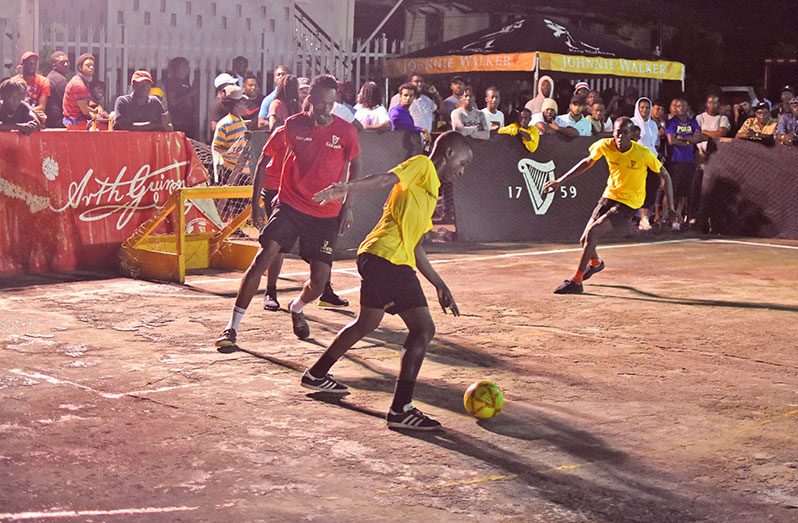 Action between High Rollers (yellow), and Hill Side Ballers at the Silver City hardcourt in the Linden edition of the Guinness ‘Greatest of the Streets’