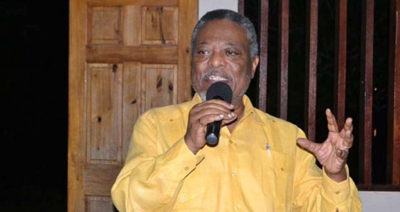 Prime Minister Samuel Hinds addressing residents at the Linden ‘Night of Reflection’