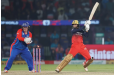 Radha Yadav hits the winning boundary, with an errant bail adding a dash of drama•BCCI