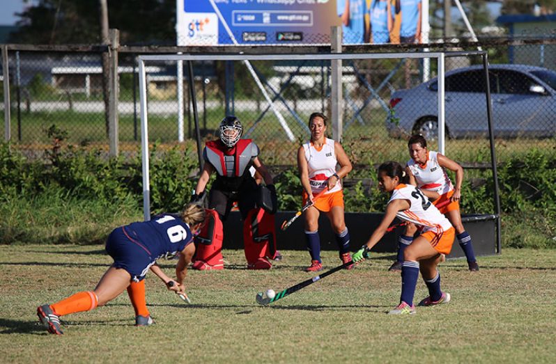 Bingo Spartans midfielder Dominique DeGroot has her shot blocked by Pizza Hut GCC.