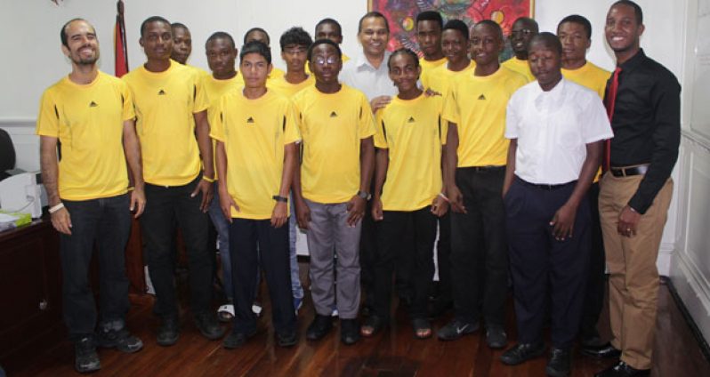Minister of Sport Dr Frank Anthony with the National Junior Hockey team