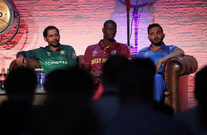 West Indies captain Jason Holder (centre) is flanked by Pakistan’s Sarfaraz Ahmed and Afghanistan’s Gulbadin Naib, as he speaks during an ICC captains media day, yesterday. (Photo courtesy ICC Media)