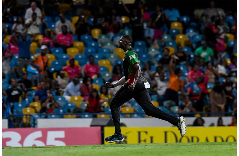 Holder Jason Holder of Saint Kitts and Nevis Patriots celebrates the dismissal of Daniel Sams of Barbados Royals during the Men's 2025 Republic Bank Caribbean Premier League match 27 between Barbados Royals and Saint Kitts and Nevis Patriots at Kensington Oval on September 11, 2025 in Bridgetown, Barbados (Photo by Randy Brooks/CPL T20 via Getty Images)