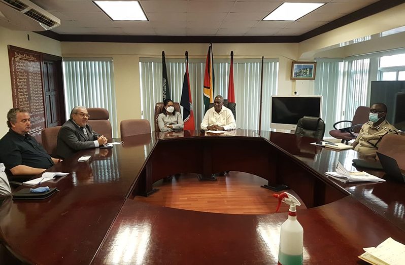 From left: Argentine Forensic Anthropologist, Dr. Luis Fondebrider; the Argentine Ambassador to Guyana, Felipe Alejandro Gardella; Permanent Secretary of the Home Affairs Ministry, Mae Toussaint Thomas; Home Affairs Minister, Robeson Benn; and Police Commissioner (ag) Nigel Hoppie during their meeting on December 15, 2020