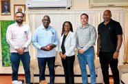 Minister of Home Affairs, Robeson Benn (second from left) flanked by Permanent Secretary Mr. Andre Ally and Mr. Hugo Boilard, Liaison Officer of the Royal Canadian Mounted Police (RCMP), and Mr. Gerrard Arulanandan of the Toronto Police Service, along with Treaty Officer, Ms. Ormella Gladstone