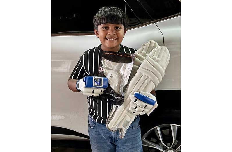 Aaryan Hooblall strikes a pose with his gear.