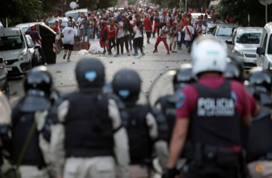 River Plate's fans clash with riot police after the Copa Libertadores Final, Second leg v Boca Juniors match was postponed. Buenos Aires, Argentina - November 24, 2018- REUTERS/Alberto Raggio/File Photo