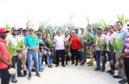 Minister of Agriculture Zulfikar Mustapha with the regional officials and coconut farmers of Region Two, who received their Brazilian green dwarf coconuts. 