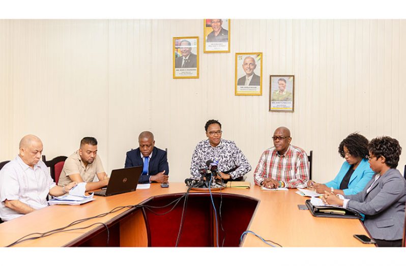 Minister within the Ministry of Communities with responsibility for Housing, Annette Ferguson, flanked by her technical team from the Central Housing and Planning Authority (Delano Williams photo)