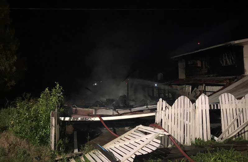 The remains of the house at Lancaster Village, Public Road, following the fire on Saturday night