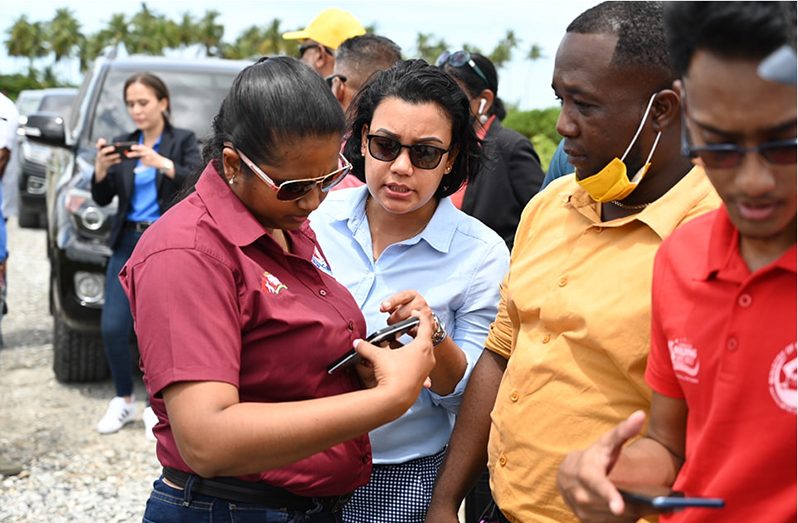 Minister Susan Rodrigues engages members of the examining team (Photo credit: CHPA)